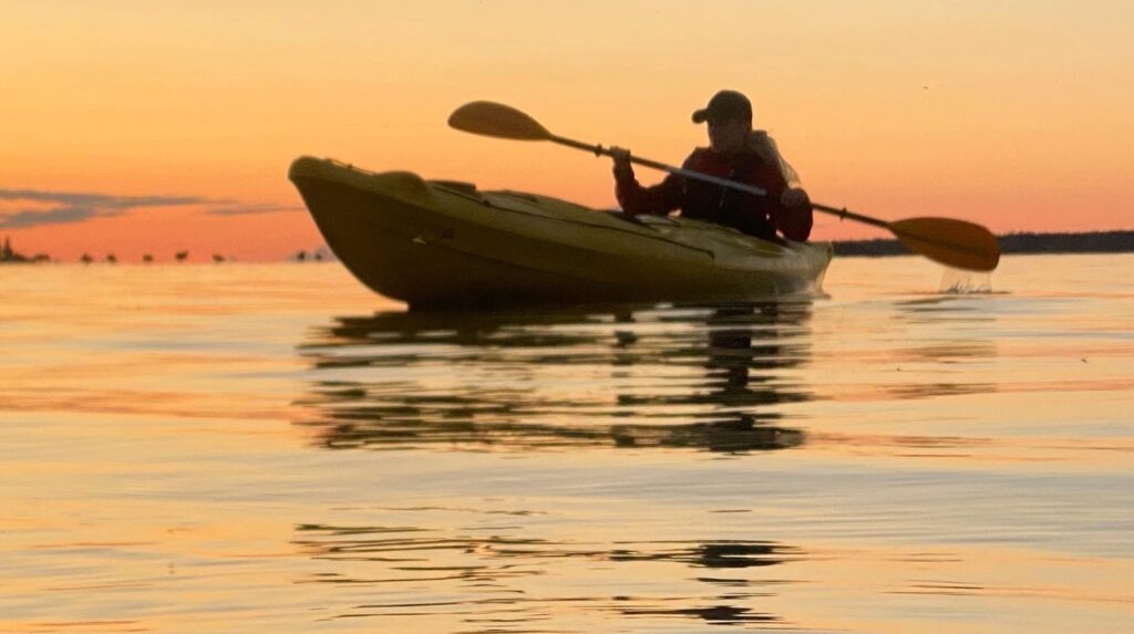 man sailing in a boat